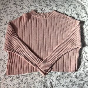 Pink cropped knit sweater